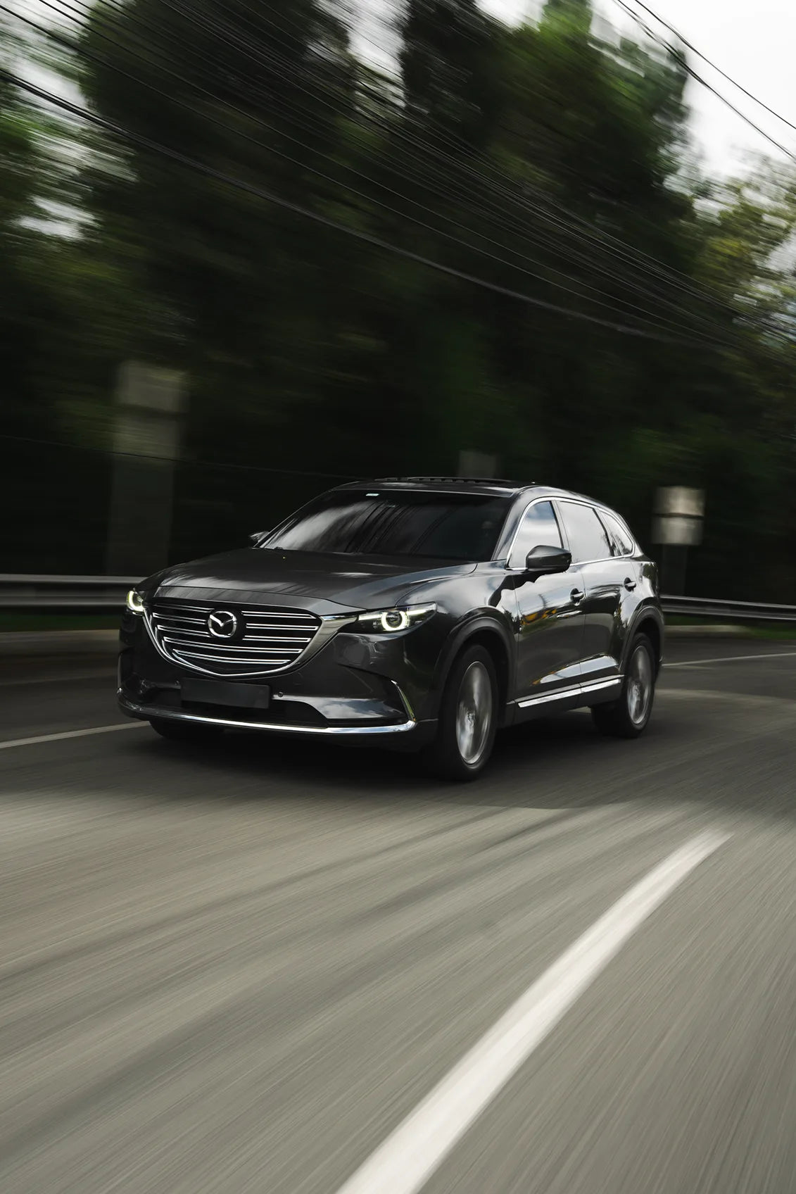 Alquiler de vehículos en Medellín - Mazda CX-9, vista trasera lateral
